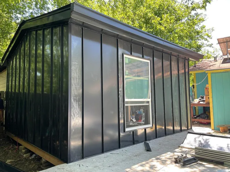 Black standing seam metal wall panels for Metal Roof Installation in Iowa Park