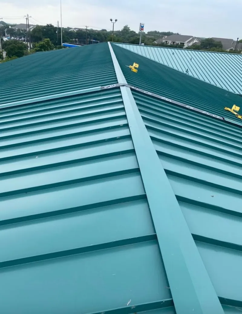 Green commercial metal roof ridge and valley for Metal Roof Repair in Iowa Park