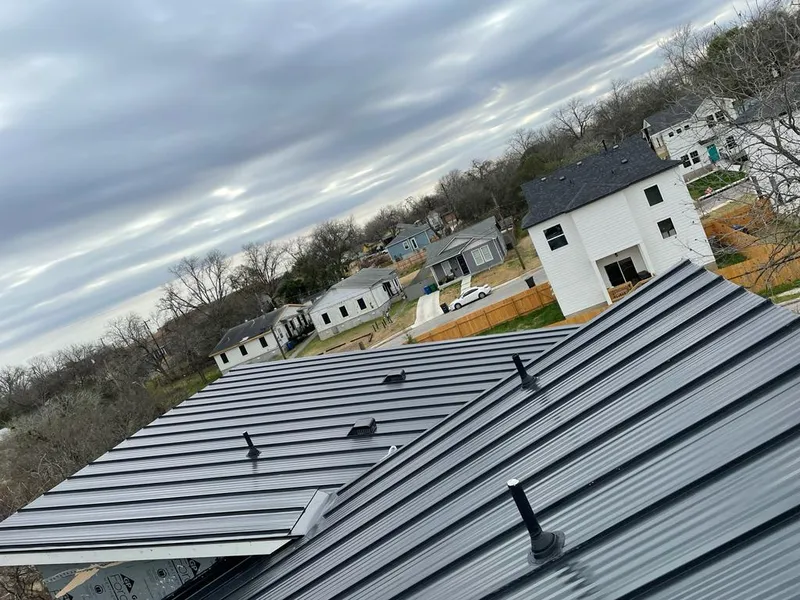 Standing seam metal roof panels with vents for Skylight Repair in Iowa Park